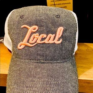Local hat . Grey with peach writing